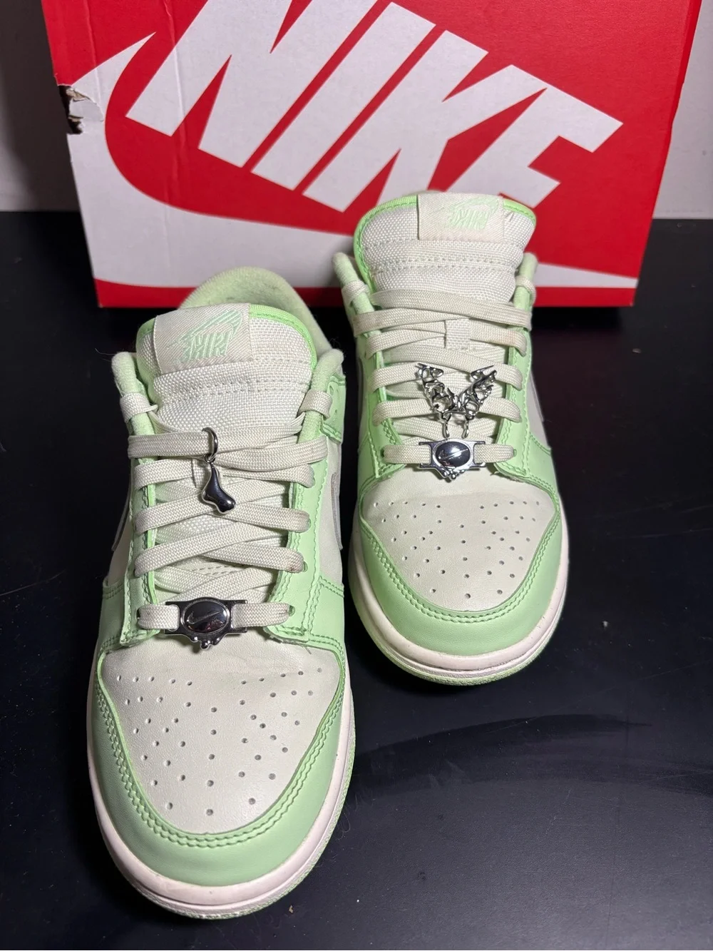 Nike Low-Top Sneakers in Light Green and Cream with Silver Swoosh